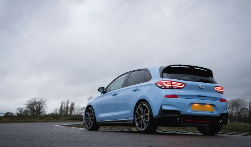 Modern blue hatchback illustrating India's best-selling passenger cars