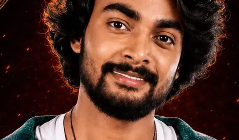 Aman Masood in a green plaid shirt in a Bigg Boss Telugu 10 promotional portrait