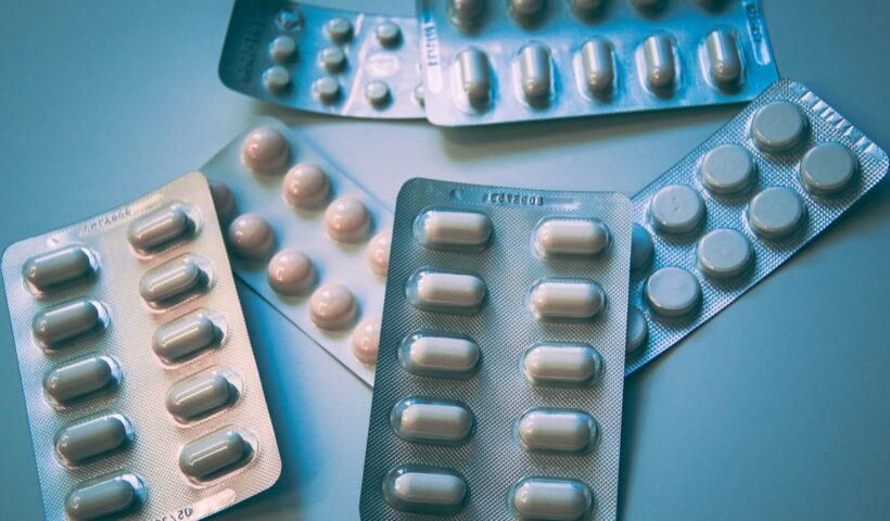 Medicines and capsules in a healthcare context