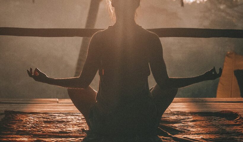 A person practising mindfulness in a peaceful setting