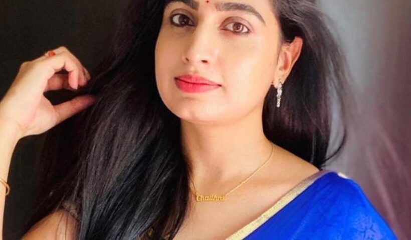 Television actress Chaitra Rai wearing a blue saree with gold embroidery