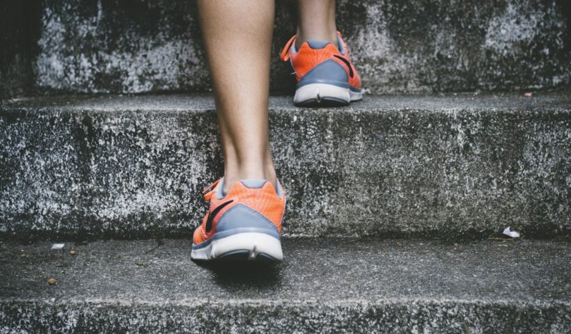 A person walking outdoors for daily exercise
