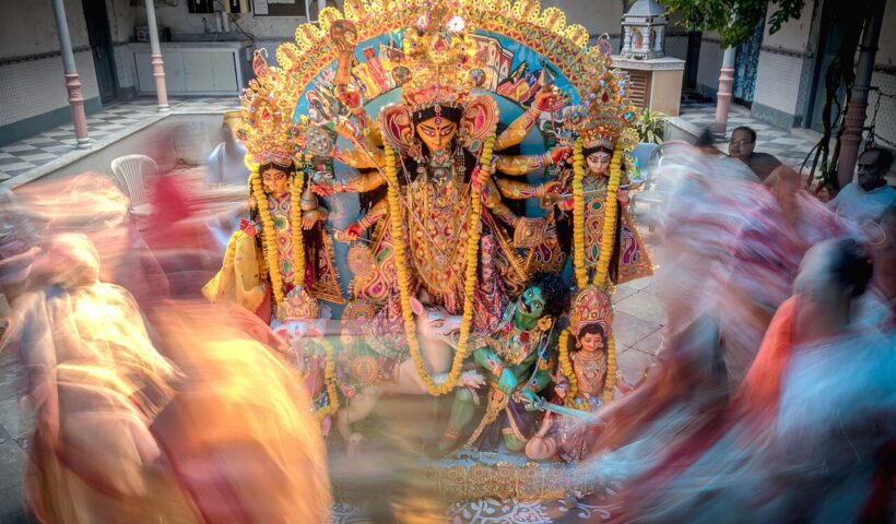 ARCHIVE IMAGE: Durga Puja idol during a traditional Kolkata immersion ceremony; not the 2026 Chorbagan stampede scene.