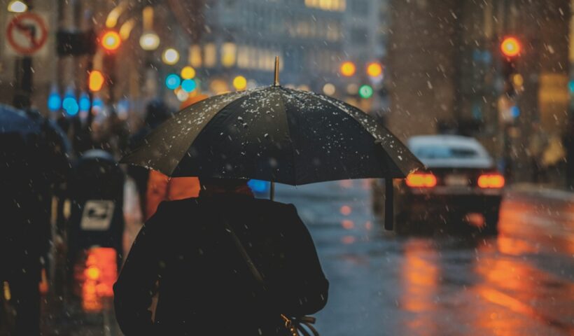 Illustrative rainy city weather scene for the India weather forecast on October 18, 2026.