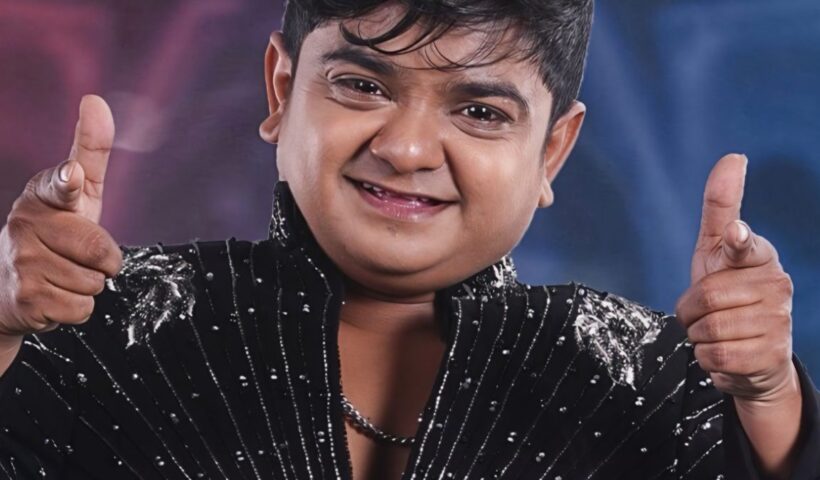 Jabardasth comedian Naresh in a black stage outfit in a Bigg Boss Telugu 10 promotional photo