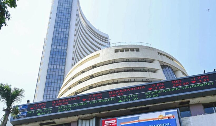 Bombay Stock Exchange building with electronic market tickers.