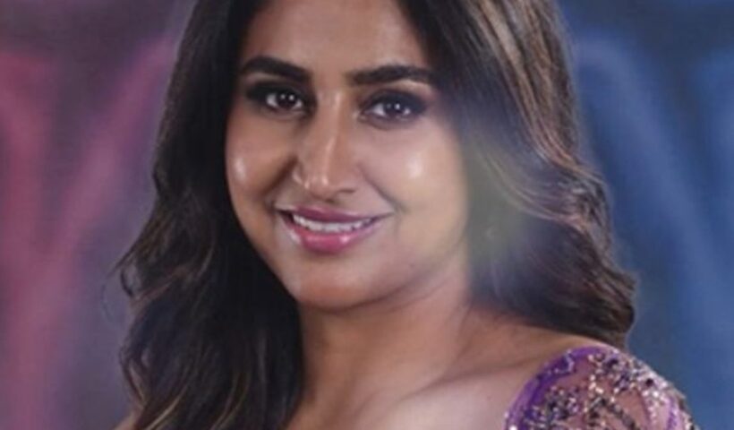Actress and presenter Varshini Sounderajan in a purple sequined Bigg Boss Telugu 10 promotional portrait